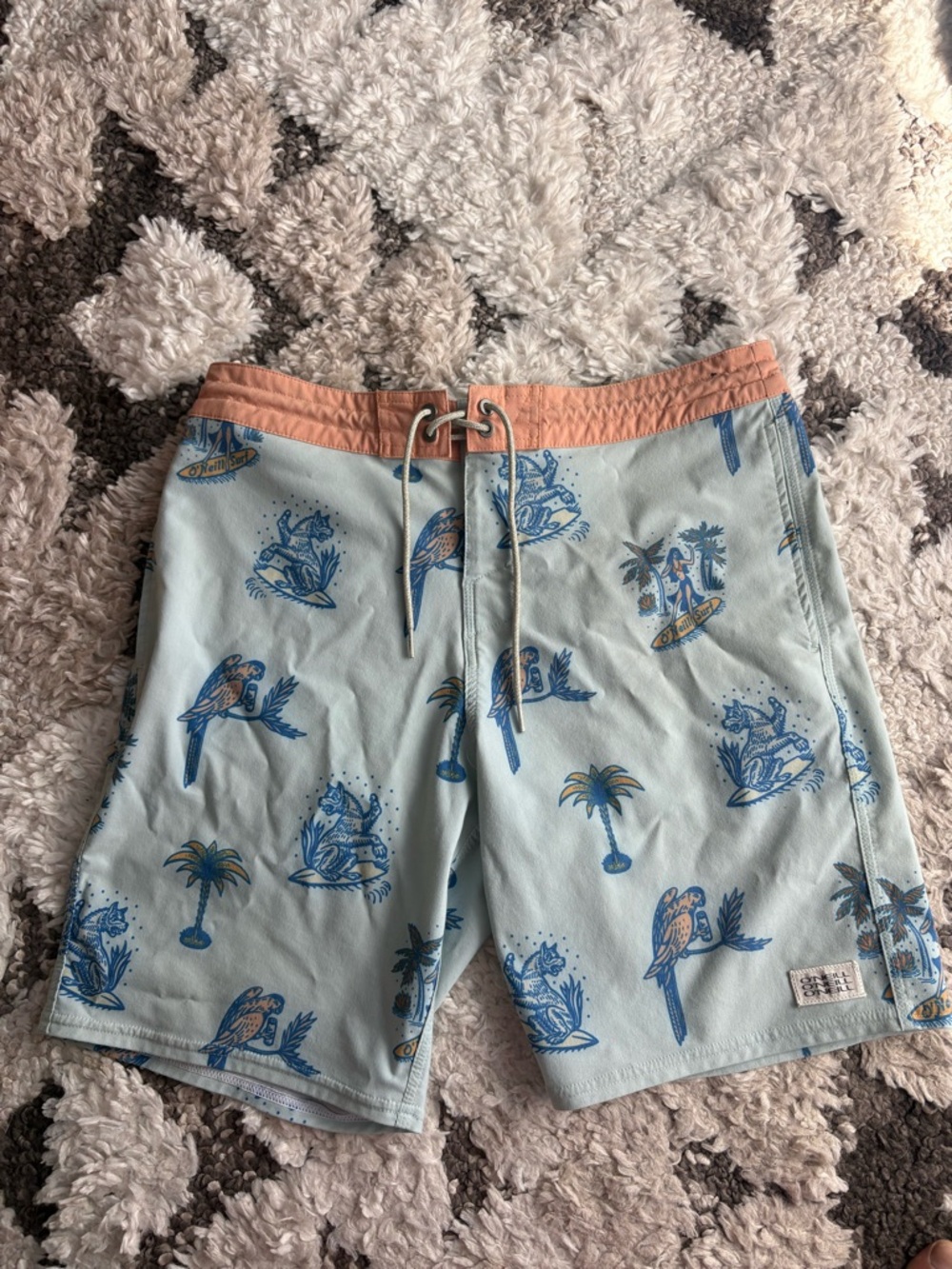 O'Neill Light Blue Swim Board Shorts with Coral Waistband and Blue Print